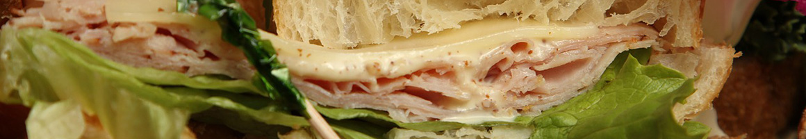 Eating Deli Gluten-Free Sandwich at Pascarella Brothers Delicatessen restaurant in Chatham, NJ.